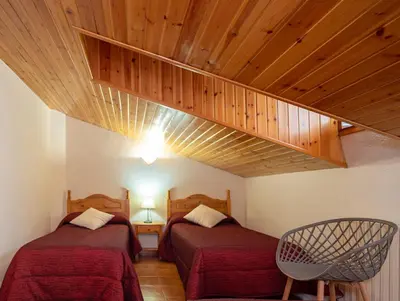 Cama o camas de una habitación en Casa rural Quintana - Montanuy