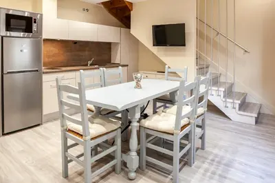 Una cocina o zona de cocina en Apartamentos Casa Ríos