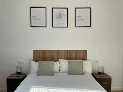 Cama o camas de una habitación en VTZ El Balcón a la Basílica II - vistas inmejorables a la Basílica del Pilar!
