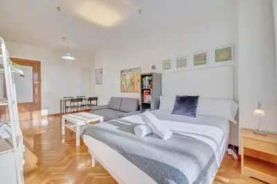 Cama o camas de una habitación en Mirasierra Suites Pamplona