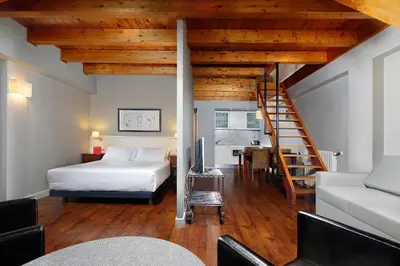 Cama o camas de una habitación en Apartamentos HG Cerler