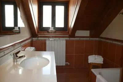 Un baño de Apartamentos Les Picardes