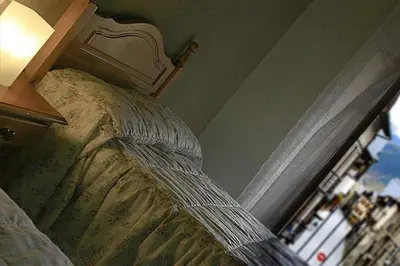 Cama o camas de una habitación en L'Oficial