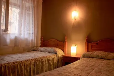 Cama o camas de una habitación en L'Oficial