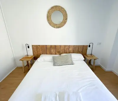 Cama o camas de una habitación en VTZ El Balcón a la Basílica III - en plena Plaza del Pilar!