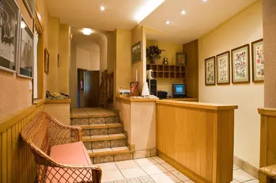 Una televisión o centro de entretenimiento en Hostal Rural Salazar