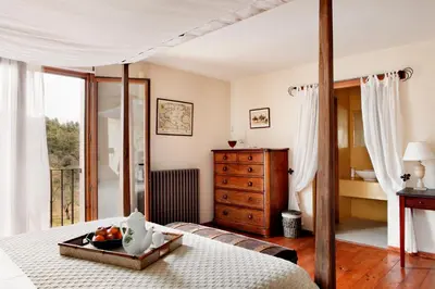 Cama o camas de una habitación en Hotel Mas de la Serra