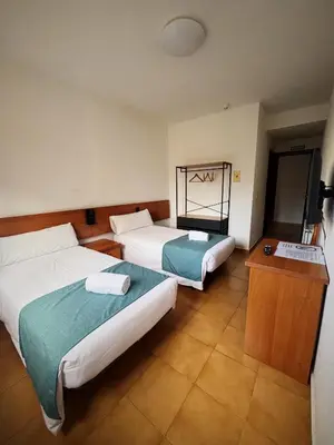Cama o camas de una habitación en Hostal Legaz