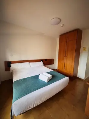 Cama o camas de una habitación en Hostal Legaz