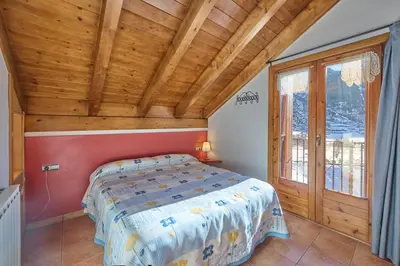 Cama o camas de una habitación en Aparthotel Areu