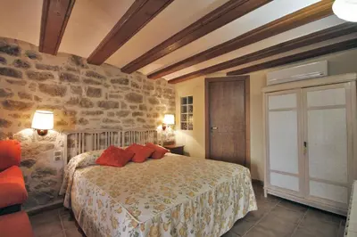 Cama o camas de una habitación en Apartamentos Santa Agueda