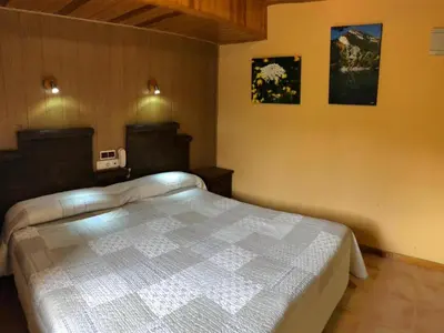 Cama o camas de una habitación en Hotel Sarao 3000