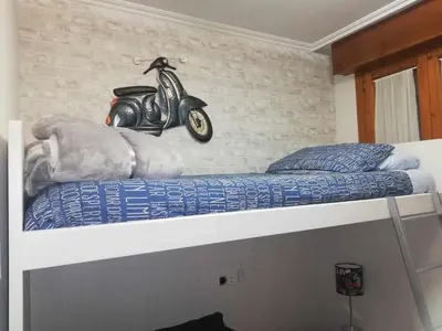 Cama o camas de una habitación en La casa del gatico