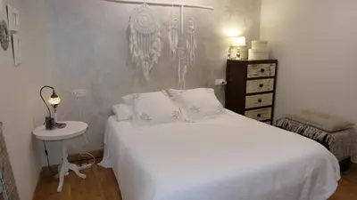 Cama o camas de una habitación en La casa del gatico