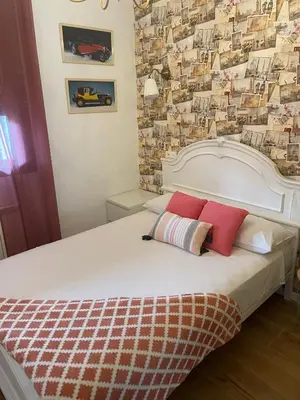 Cama o camas de una habitación en Apartahotel Belchite