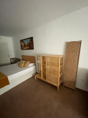 Cama o camas de una habitación en Apartahotel Belchite