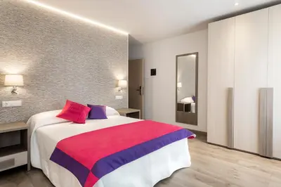 Cama o camas de una habitación en Hotel Rural Auñamendi