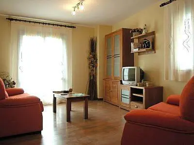 Una televisión o centro de entretenimiento en Apartamentos Estop