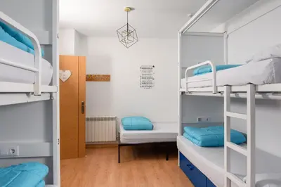 Cama o camas de una habitación en Albergue Estrella Guia