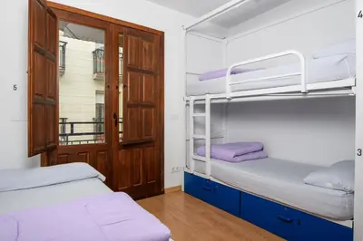 Cama o camas de una habitación en Albergue Estrella Guia