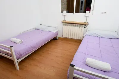 Cama o camas de una habitación en Albergue Estrella Guia