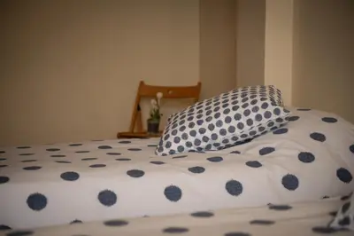 Cama o camas de una habitación en Apartamentos Aguilar