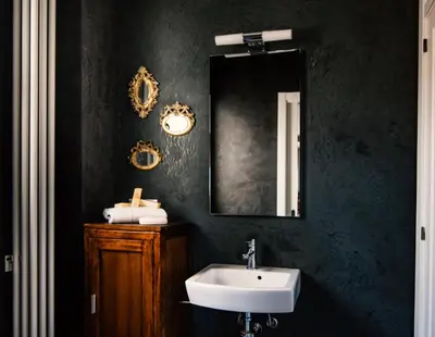Un baño de La Casa dels Abeuradors