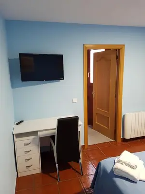 Una televisión o centro de entretenimiento en HOSTAL ITXASO-ENEA