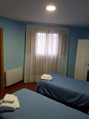 Cama o camas de una habitación en HOSTAL ITXASO-ENEA