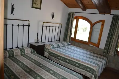 Cama o camas de una habitación en Casa Rural La Vall del Cadi