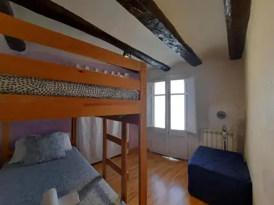 Cama o camas de una habitación en Casa Rural CAL ROCCO Porta del Pirineu