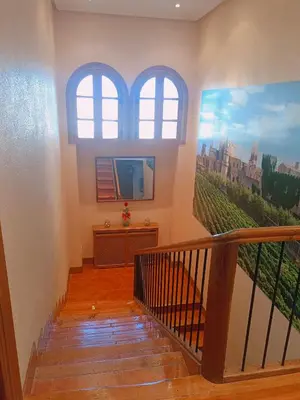 Una televisión o centro de entretenimiento en Ronda del Castillo