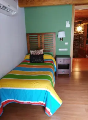 Cama o camas de una habitación en Masia d'en Valentí
