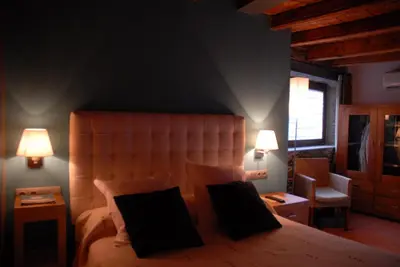 Cama o camas de una habitación en Masia d'en Valentí