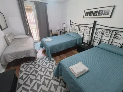 Cama o camas de una habitación en La Posada de San Marcial