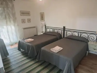 Cama o camas de una habitación en La Posada de San Marcial