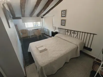 Cama o camas de una habitación en La Posada de San Marcial
