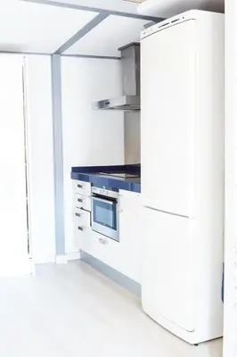 Una cocina o zona de cocina en FANTASTICA BUHARDILLA PZ. PILAR
