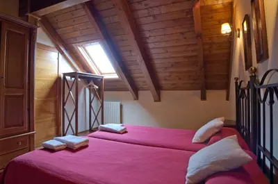 Cama o camas de una habitación en Apartamentos Casa Lavedan