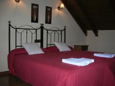 Cama o camas de una habitación en Apartamentos Casa Lavedan