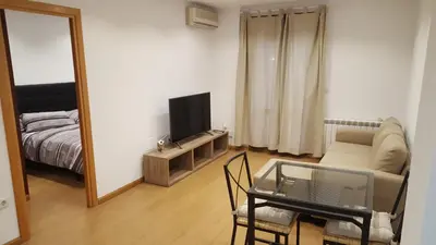 Una televisión o centro de entretenimiento en Apartamenticos Boggiero II