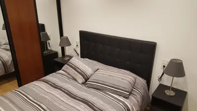 Cama o camas de una habitación en Apartamenticos Boggiero II