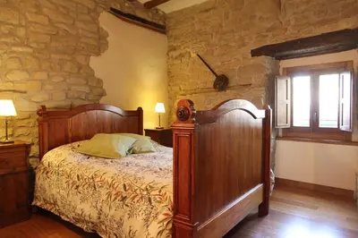 Cama o camas de una habitación en CASA RURAL FERNANDOEGEA