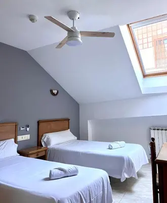 Cama o camas de una habitación en Ciudad de Jaca
