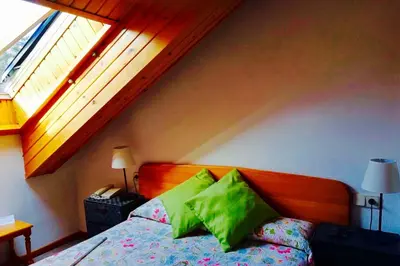 Cama o camas de una habitación en Hotel Mariana