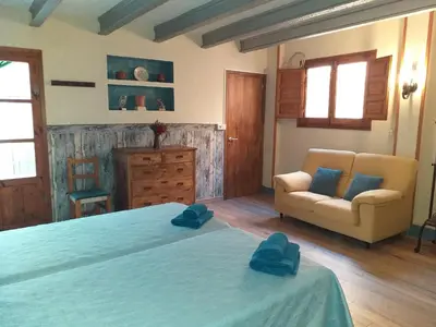 Cama o camas de una habitación en Casa Rural Marila