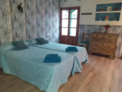 Cama o camas de una habitación en Casa Rural Marila
