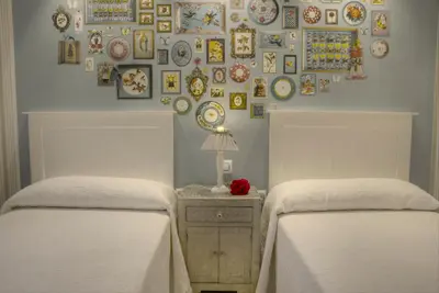 Cama o camas de una habitación en Apartamentos Rurales El Rapallo