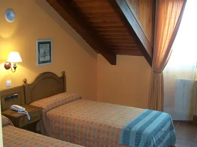 Cama o camas de una habitación en Hotel Palazio