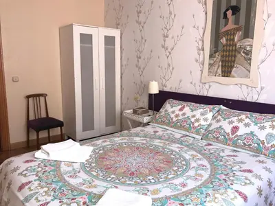 Cama o camas de una habitación en Alojamientos Iruña